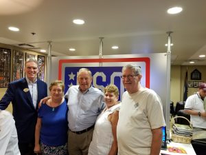 Some of USO's Volunteers and sponsors at an event.